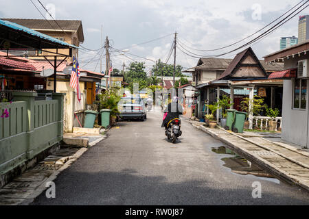 Kampung Baru, Scene di strada tradizionale Malay enclave, Kuala Lumpur, Malesia. Foto Stock