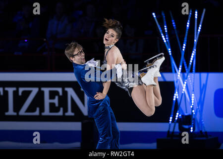 Kaitlin Hawayek e Jean-Luc Baker DA STATI UNITI D'AMERICA eseguire il loro programma espositivo durante 2018 World Figure Skating Championships in Milano, Italia Foto Stock