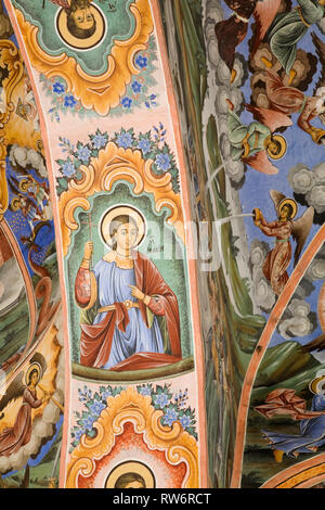 I religiosi dipinti ad affresco sulla parte esterna della Natività chiesa al monastero di Rila, Rila, Bulgaria, Europa orientale Foto Stock