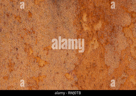 Vecchio Distressed Brown Rame Terracotta arrugginito sfondo in pietra con tessitura grossolana multicolore di inclusioni. Gradiente macchiata grossa superficie granulosa Foto Stock