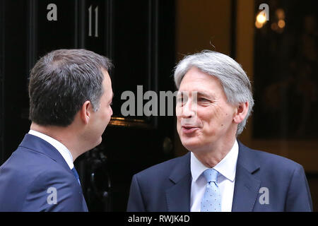 Londra, UK, UK. 6 Mar, 2019. Alexander De Croo, vice primo ministro belga e ministro delle finanze e della cooperazione allo sviluppo è visto parlare con Philip Hammond - Cancelliere dello scacchiere al di fuori n. 11 di Downing Street. Credito: Dinendra Haria/SOPA Immagini/ZUMA filo/Alamy Live News Foto Stock