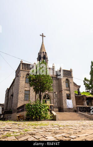 Piccola chiesa cristiana in Pingyao Città Antica, nella provincia di Shanxi, Cina. Conosciuta come una delle meglio conservate città della Cina, di Pingyao è un patrimonio mondiale H Foto Stock