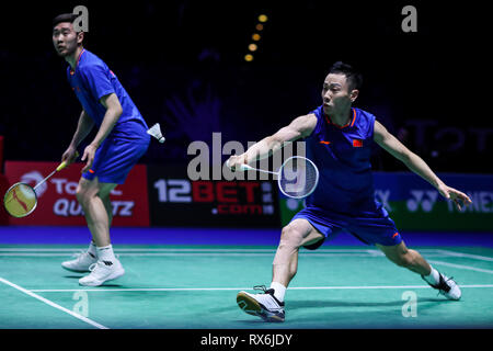 Birmingham. 8 Mar, 2019. Della Cina di Liu Cheng/Zhang Nan(R) competere durante gli Uomini Doppio Quarti di finale corrisponde con la Malaysia ha Aaron Chia e Soh Wooi Yik a All England Open Badminton Championships 2019 a Birmingham, la Gran Bretagna il 8 marzo 2019. Credito: Tang Shi/Xinhua/Alamy Live News Foto Stock