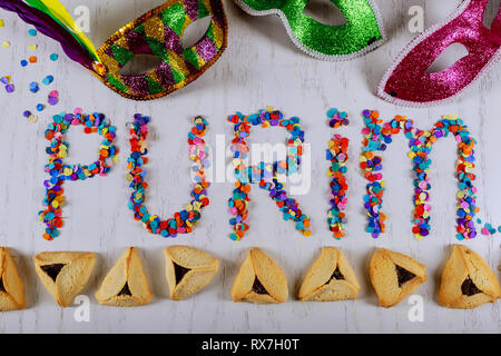 Hamantaschen cookie e maschera di Carnevale purim ebraico celebrazione di vacanza Foto Stock