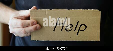 Cartello con la scritta 'Aiuto' Foto Stock