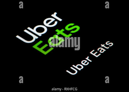 Una inquadratura ravvicinata del Uber mangia icona app, come si vede sullo schermo di un telefono intelligente (solo uso editoriale) Foto Stock