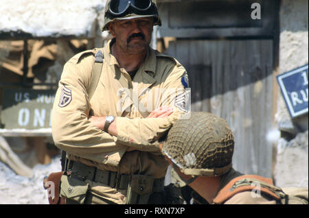 WW2 American GIs in combattimento (Reenactors) Foto Stock