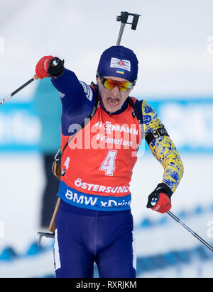 Il 10 marzo 2019, Svezia, Östersund: Biathlon: World Championship, pursuit 12,5 km, uomini. Dmytro Pidruchnyi dall'Ucraina cheers al traguardo. Foto: Sven Hoppe/dpa Foto Stock