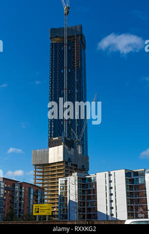 Due di Deansgate torre quadrata a blocchi (in costruzione) dal primo Street, Manchester, Inghilterra, Regno Unito Foto Stock