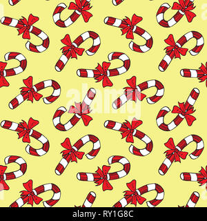 Natale candy cane con nastro, disegnati a mano doodle schizzo Illustrazione a colori, seamless pattern design morbido su sfondo giallo Foto Stock