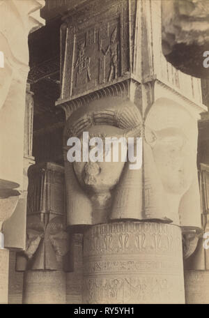 Dendera, Interno del tempio, Hathor capitelli, c. 1870 - 1880. Antonio Beato (British, c. 1825-1903). Albume stampa dal collodio umido negativo; immagine: 26 x 20 cm (10 1/4 x 7 7/8 in.); mascherino: 50,8 x 40,6 cm (20 x 16 Foto Stock