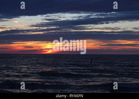 Godere di un tramonto Foto Stock