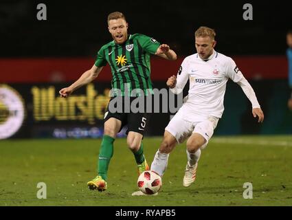 Muenster, Deutschland. Xii Mar, 2019. firo: 12.03.2019, calcio, 2018/2019, 3.Bundesliga SC Preussen, la Prussia Muenster Munster - Hansa Rostock 0 : 1 duelli Fabian Menig | Utilizzo di credito in tutto il mondo: dpa/Alamy Live News Foto Stock