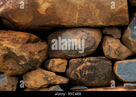 Un background testurizzata closeup di un rustico in pietra. Foto Stock