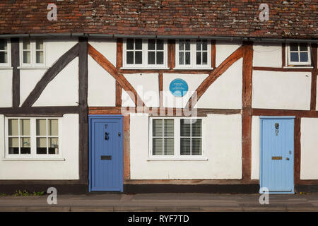 Un cottage in Crowmarsh Gifford con un Oxfordshire targa blu commemorando Jethro Tull, inventore del cavallo-disegnato una seminatrice. Foto Stock