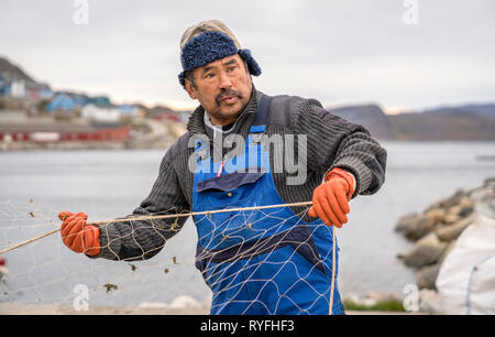 Pescatore, Qaqortoq, Groenlandia meridionale Foto Stock