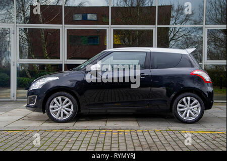 2014 Suzuki Swift SZ-L hot berlina compatta automobile Foto Stock