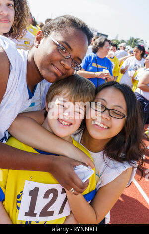 Miami Florida,Miami Dade College,North Campus,Special Olympics,needs,disabled,competition,sports,athlete,students,volontariato volontariamente Foto Stock