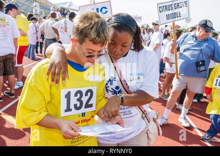 Miami Florida,Miami Dade College,North Campus,Special Olympics,needs,disabled,competition,sports,athlete,students,volontariato volontariamente Foto Stock