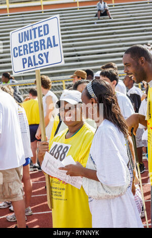 Miami Florida,Miami Dade College,North Campus,Special Olympics,needs,disabled,competition,sports,athlete,students,volontariato volontariamente Foto Stock