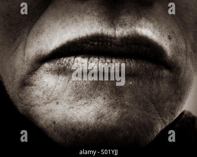 Ravvicinata di una donna di mezza età la bocca Foto Stock