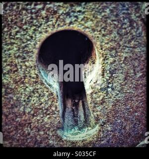 Foro per la chiave porta vecchia vintage Foto Stock