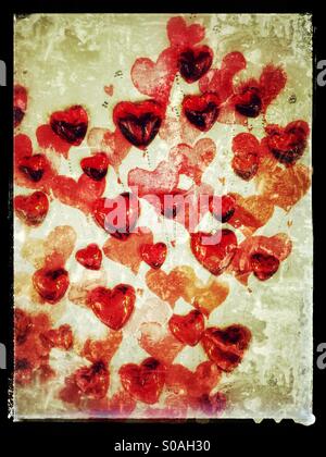 Textured grungy rosa, rosso e bianco il giorno di San Valentino cuori Foto Stock