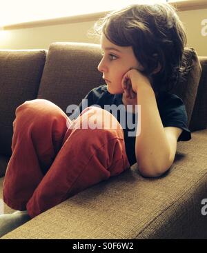 Bambino Pensive Foto Stock