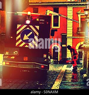 Roma street cleaner Foto Stock