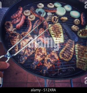 POV. Barbecue Foto Stock