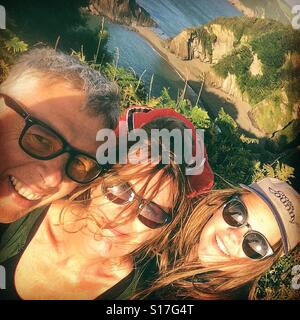 Famiglia in vacanza selfie Foto Stock