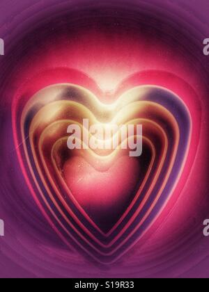 Cuore in plastica sagomata cookie cutters Foto Stock