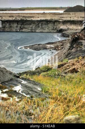 Tar sands, Fort McMurray,laghetto di fanghi Foto Stock