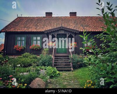 Vecchia casa tradizionale Piecki villaggio nella regione Masuria, Polonia Foto Stock