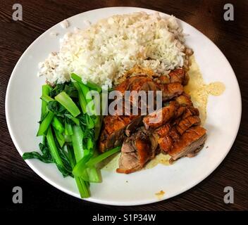 Il cantonese anatra arrosto con riso e verdure Foto Stock