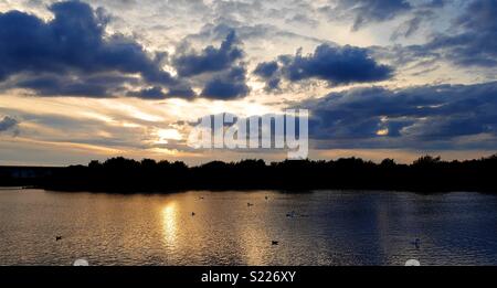 Tramonto su Southport lago marino Foto Stock