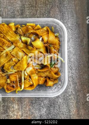 Carni bovine fritto divertimento ho riso tagliatelle takeaway cinese Foto Stock