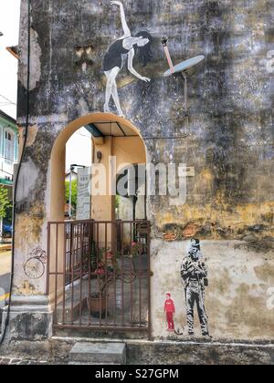 Whimsical di arte di strada nel centro storico di George Town, Penang, Malaysia. Foto Stock