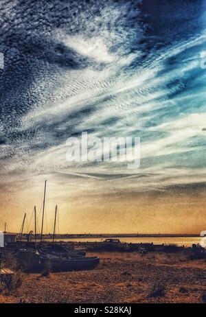 Tramonto sulla spiaggia a Whitstable Foto Stock