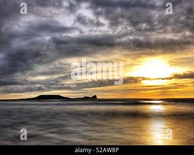 Testa di vermi al tramonto, Rhossili beach, Gower, Galles, Settembre. Foto Stock