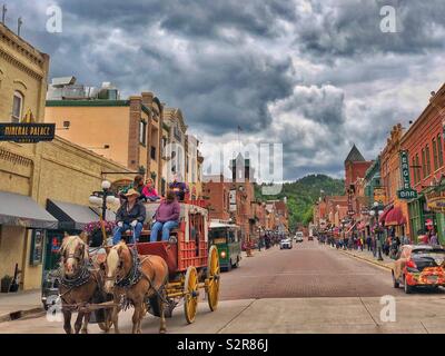 Cavallo e gite in carrozza nella Deadwood, SD Foto Stock