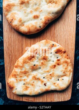 Plain mini pane naan Foto Stock
