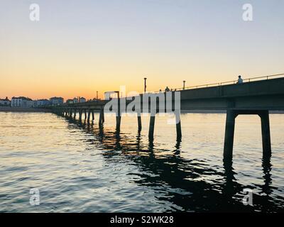 Trattare pier, Kent, Regno Unito al tramonto di ferragosto durante una ondata di caldo Foto Stock