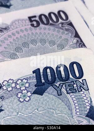 Primo piano di alcuni giapponesi di banconote della moneta giapponese è chiamato lo yen. Foto Stock