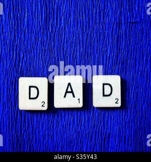 Piastrelle di legno incantesimo papà. Foto Stock