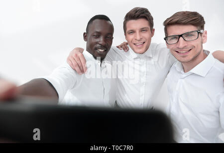 Close up.sorridente dipendenti tenendo un selfie Foto Stock