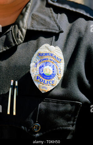 Close up di un nativo americano sergente del badge dal Tohono O'Odham prenotazione la polizia in Arizona Foto Stock