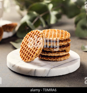 Syrupwaffles cookie e tazza di tè Foto Stock