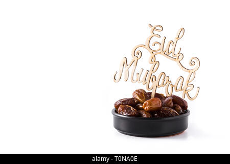 Date e Eid Mubarak messaggio isolati su sfondo bianco. Copyspace Foto Stock