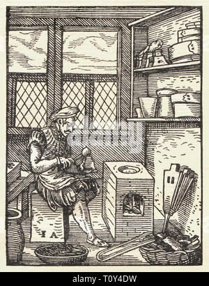 Un punchcutter preparare una lettera punzone per produrre il carattere tipografico da utilizzare in tipografia. Xilografia da Jost Amman (1539-1591) da Das Ständebuch pubblicato nel 1568. Foto Stock